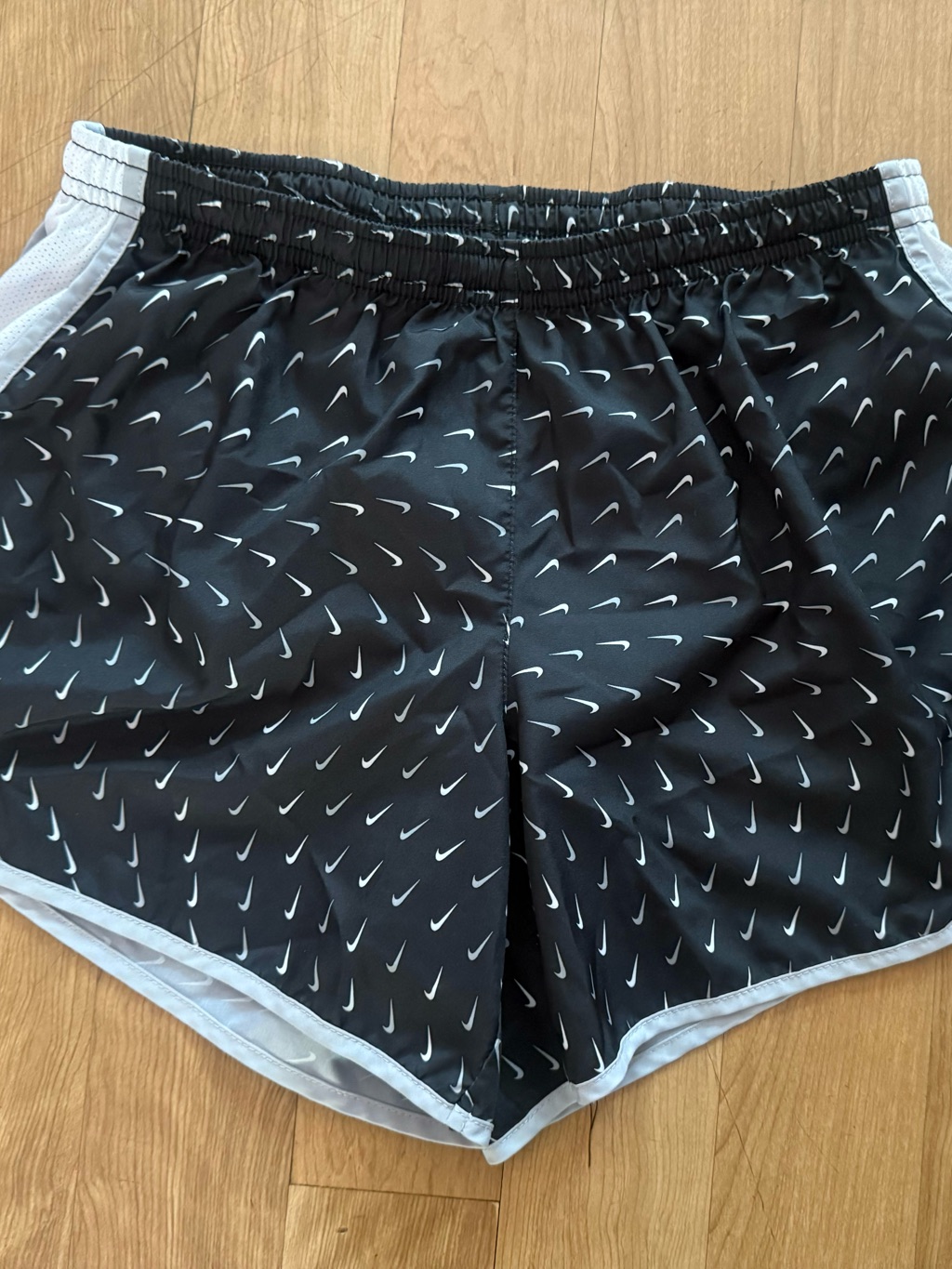 Nike Black Athletic Shorts With White Swoosh Print